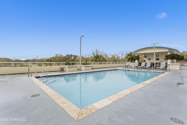 2060 Beach Blvd Unit 102, Biloxi, MS 39531 - community pool with a patio area