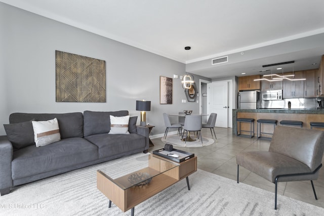 2060 Beach Blvd Unit 102, Biloxi, MS 39531 - living room with baseboards and light tile patterned floors