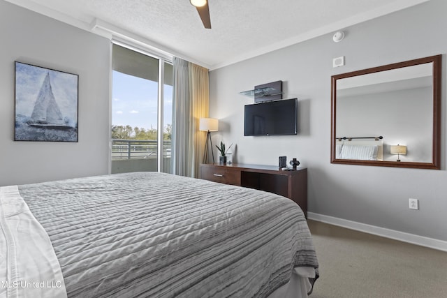 2060 Beach Blvd Unit 102, Biloxi, MS 39531 - bedroom featuring carpet flooring, a textured ceiling, and ceiling fan