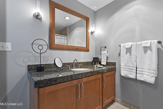2060 Beach Blvd Unit 102, Biloxi, MS 39531 - bathroom with vanity and tile patterned flooring