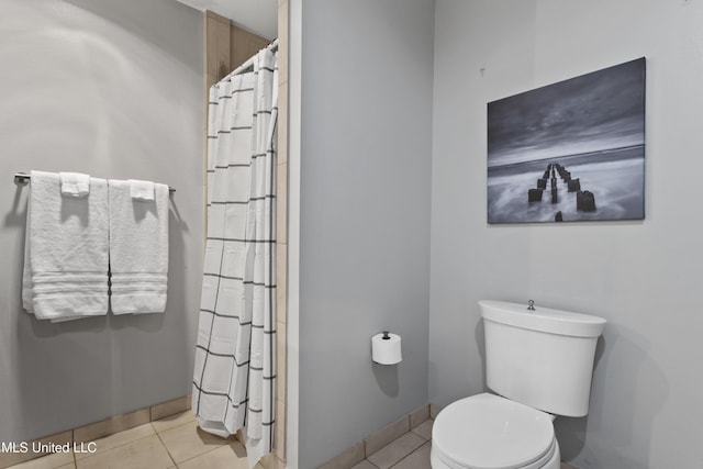 2060 Beach Blvd Unit 102, Biloxi, MS 39531 - bathroom with tile patterned floors and curtained shower