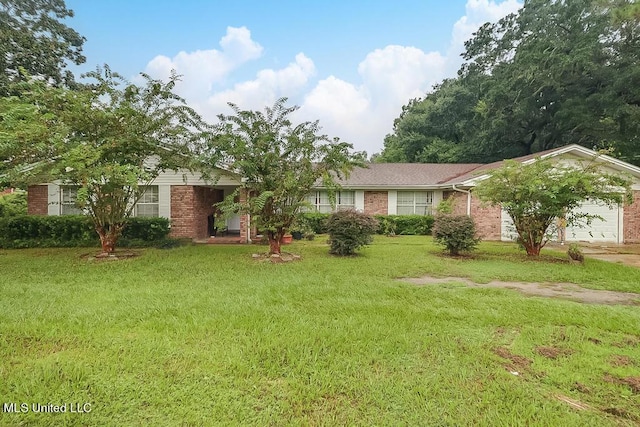 ranch-style house with a garage and a front lawn