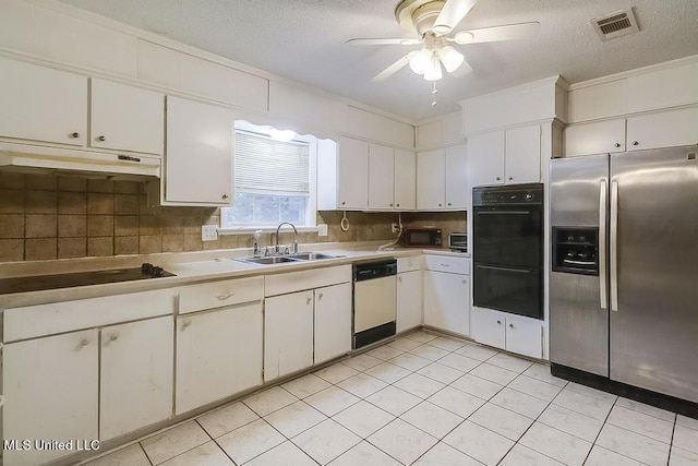 347 Rodenberg Ave, Biloxi, MS 39531 - kitchen featuring black appliances, under cabinet range hood, a sink, backsplash, and a textured ceiling