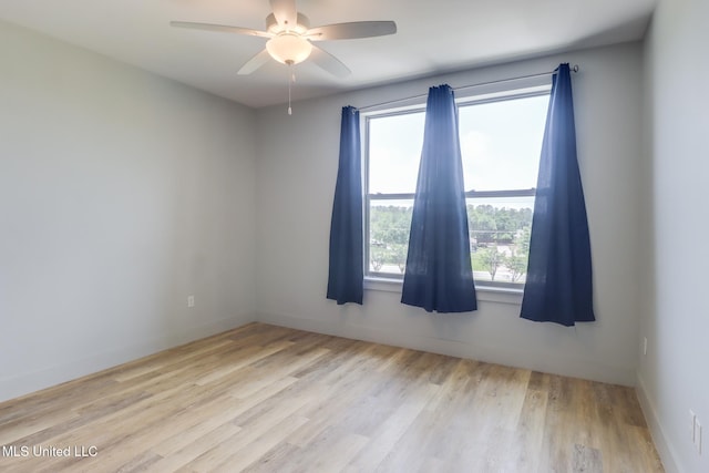 2501 Bienville Blvd Unit 334, Ocean Springs, MS 39564 - empty room featuring wood finished floors, a ceiling fan, and baseboards