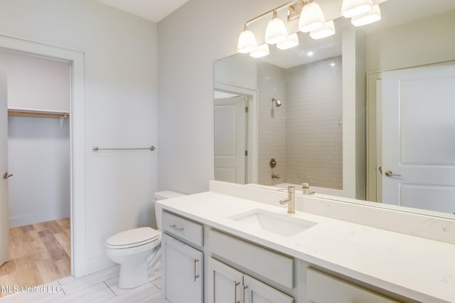2501 Bienville Blvd Unit 334, Ocean Springs, MS 39564 - full bathroom featuring toilet, vanity, and  shower combination