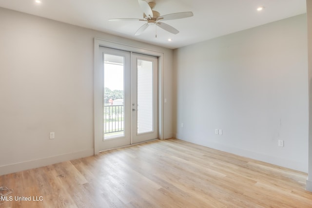 2501 Bienville Blvd Unit 334, Ocean Springs, MS 39564 - empty room with ceiling fan, french doors, light wood-style flooring, recessed lighting, and baseboards