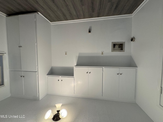 laundry room with washer hookup, wooden ceiling, cabinets, and ornamental molding