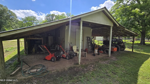 308 Walnut St, Benoit, MS 38725 - view of pole building with a carport and a yard