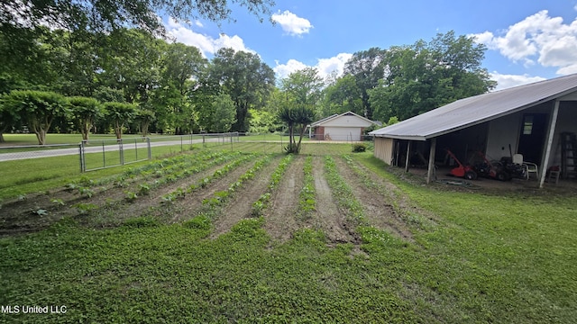 308 Walnut St, Benoit, MS 38725 - view of yard with a pole building and an outdoor structure
