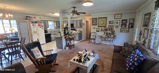 308 Walnut St, Benoit, MS 38725 - living area featuring ornamental molding, a ceiling fan, light tile patterned floors, and a chandelier