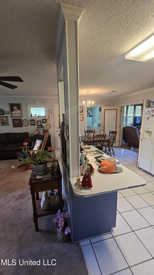 308 Walnut St, Benoit, MS 38725 - living area with a textured ceiling, a chandelier, a ceiling fan, and light tile patterned floors