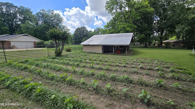 308 Walnut St, Benoit, MS 38725 - view of yard featuring an outbuilding