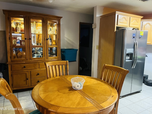 856 Saint Joseph St, Waveland, MS 39576 - dining room with light tile patterned floors