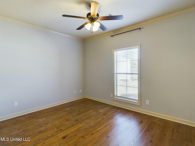 unfurnished room with ceiling fan, ornamental molding, and dark hardwood / wood-style flooring