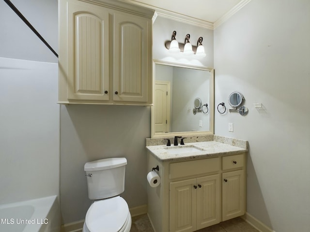 bathroom with toilet, vanity, a bathtub, and ornamental molding