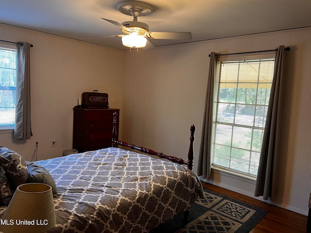 bedroom featuring hardwood / wood-style flooring and ceiling fan