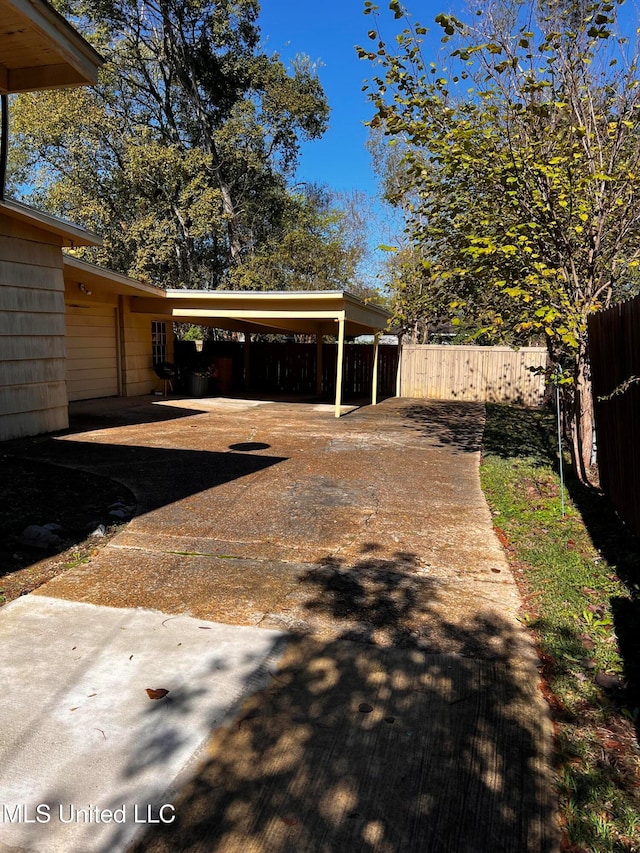 view of yard with a carport