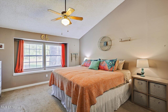 bedroom with a textured ceiling, carpet, a ceiling fan, baseboards, and lofted ceiling