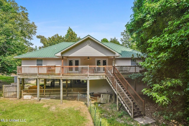 19639 Laterre Dr, Kiln, MS 39556 - back of property with french doors, stairs, a wooden deck, ceiling fan, and a metal roof