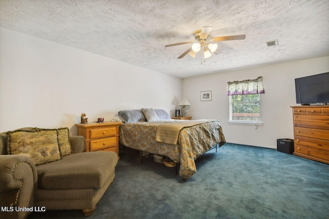 19639 Laterre Dr, Kiln, MS 39556 - carpeted bedroom featuring a textured ceiling and ceiling fan
