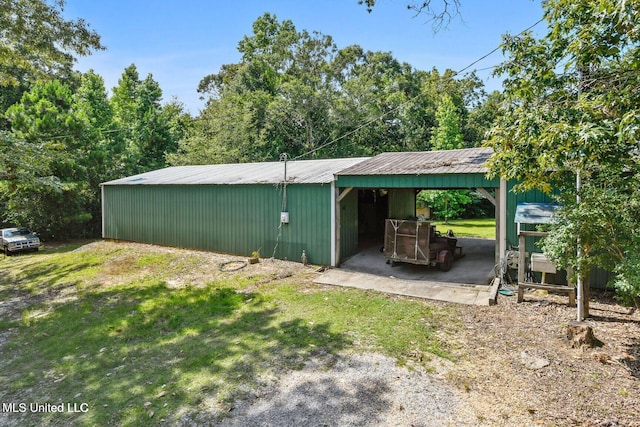 19639 Laterre Dr, Kiln, MS 39556 - view of pole building with a yard and a detached carport