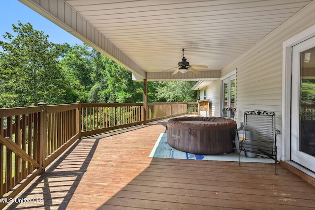 19639 Laterre Dr, Kiln, MS 39556 - wooden deck featuring ceiling fan and a hot tub