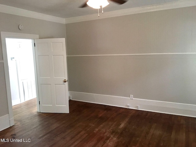 empty room with ceiling fan, ornamental molding, and dark hardwood / wood-style floors