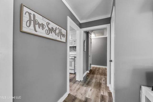 2207 Gregory Blvd, Gulfport, MS 39507 - corridor featuring attic access and wood finished floors