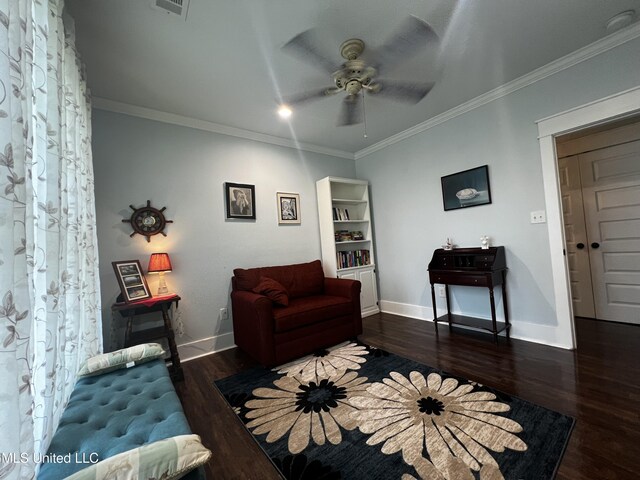 914 39th Ave, Gulfport, MS 39501 - living area featuring a ceiling fan, wood finished floors, crown molding, and baseboards