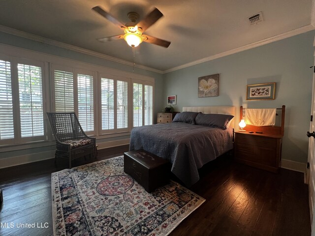 914 39th Ave, Gulfport, MS 39501 - bedroom with dark wood-style flooring, baseboards, crown molding, and ceiling fan