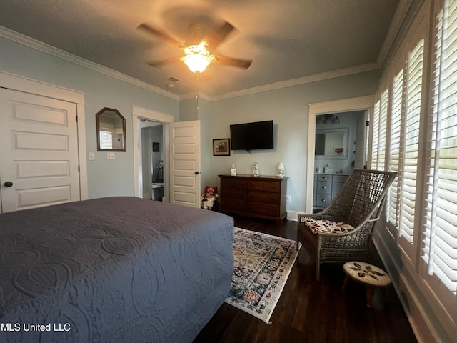 914 39th Ave, Gulfport, MS 39501 - bedroom featuring dark wood-style flooring, crown molding, ceiling fan, and baseboards