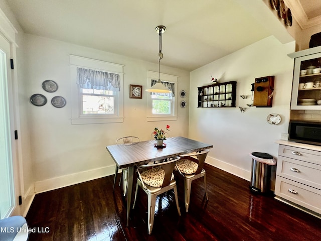 914 39th Ave, Gulfport, MS 39501 - dining room featuring dark wood-style flooring and baseboards