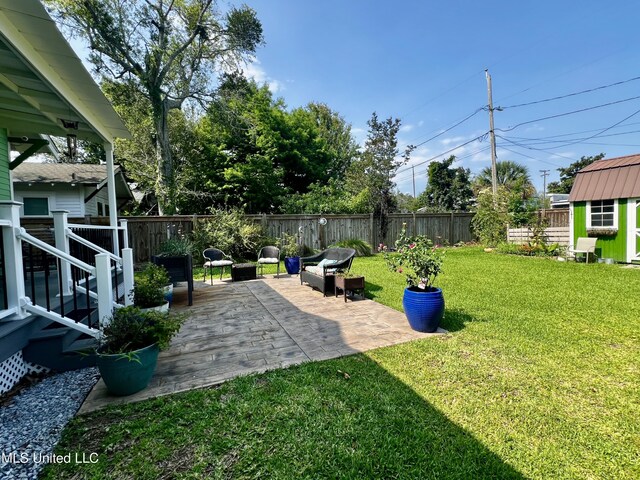 914 39th Ave, Gulfport, MS 39501 - view of yard with a patio and an outbuilding
