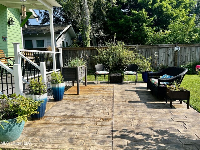 914 39th Ave, Gulfport, MS 39501 - fenced backyard with a wooden deck