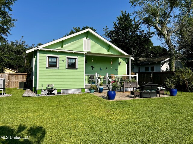 914 39th Ave, Gulfport, MS 39501 - back of property featuring a patio area and central air condition unit