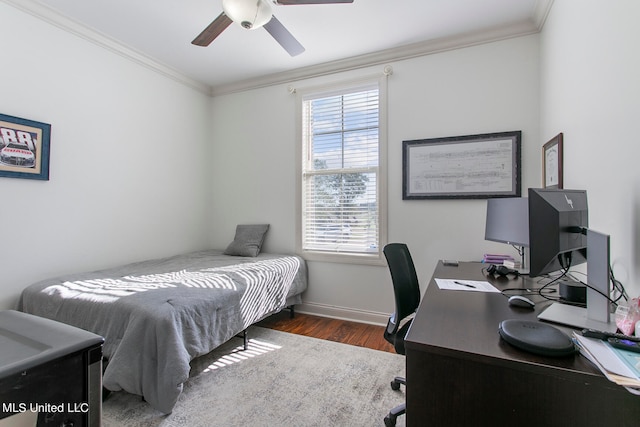 bedroom featuring crown molding, dark hardwood / wood-style floors, and ceiling fan