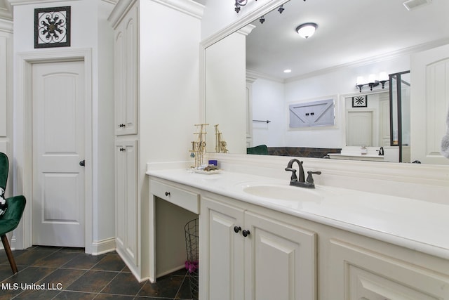 bathroom featuring vanity, ornamental molding, and tile patterned floors