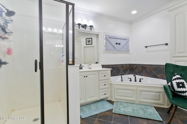 bathroom featuring vanity, ornamental molding, and independent shower and bath