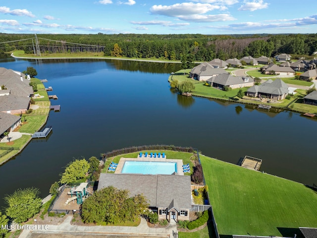 birds eye view of property featuring a water view