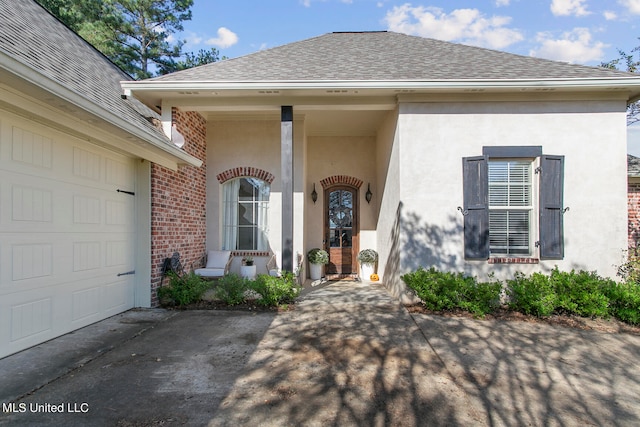 entrance to property featuring a garage