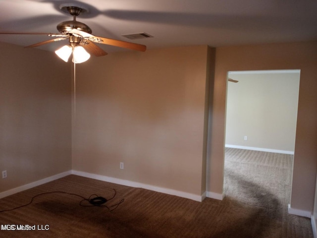 carpeted empty room with ceiling fan