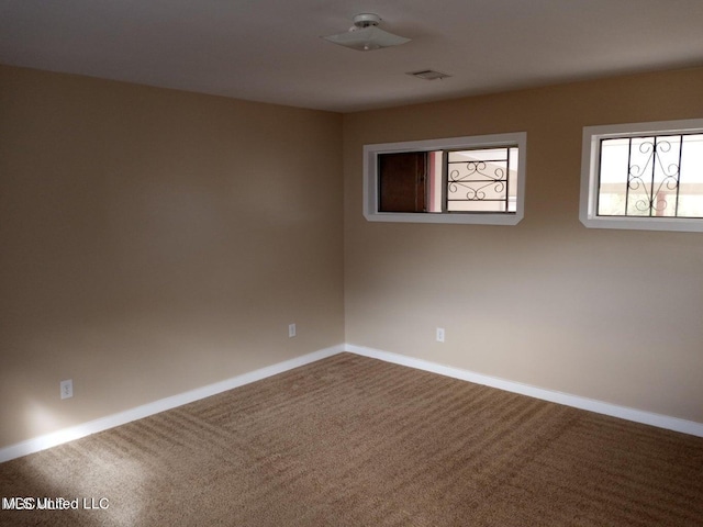 empty room with carpet floors