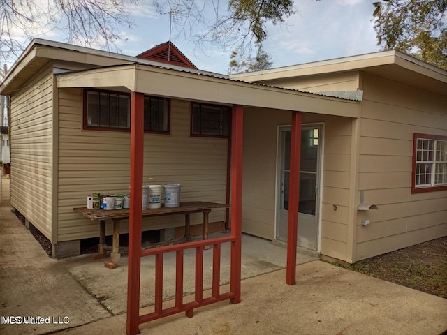 rear view of property with a patio area