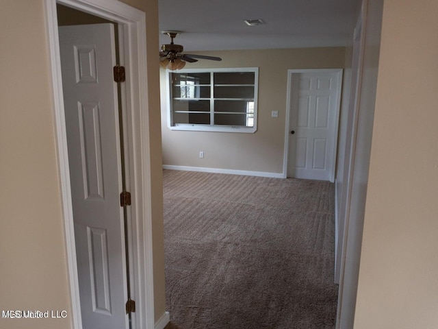 corridor featuring carpet floors