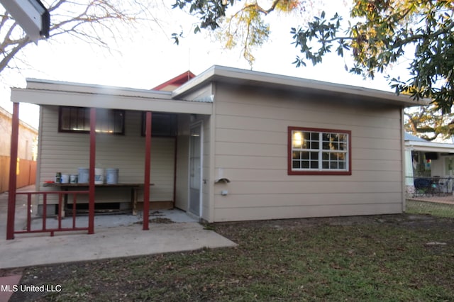 back of house featuring a patio