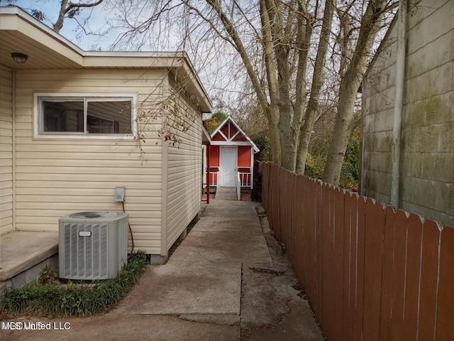 view of property exterior with central AC unit