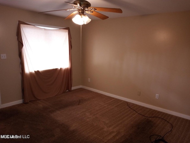 spare room with carpet and ceiling fan