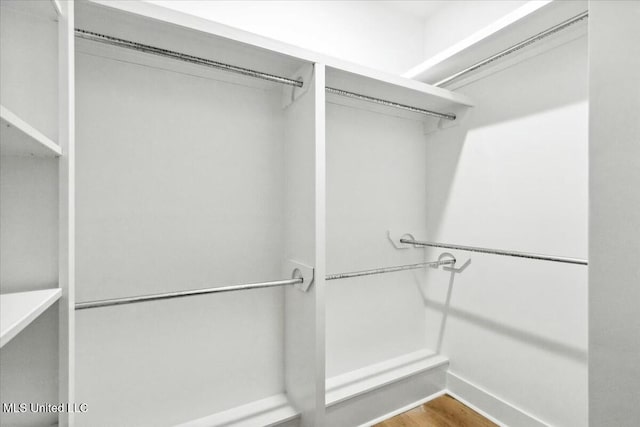 213 Dolly Ln, Magee, MS 39111 - walk in closet featuring wood finished floors