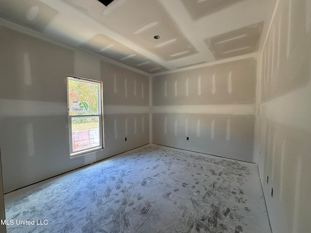 spare room featuring concrete flooring