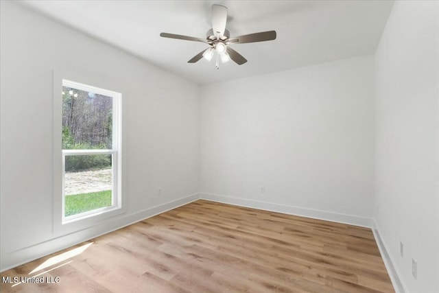 213 Dolly Ln, Magee, MS 39111 - unfurnished room with plenty of natural light, light wood-type flooring, baseboards, and ceiling fan